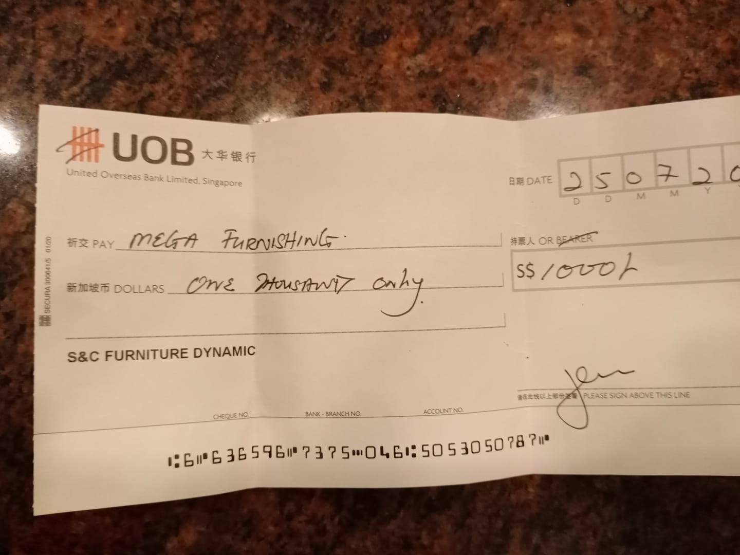 Honest Soul Finds 1 000 UOB Cheque Returns It To Newton Hotel Desk For Owner