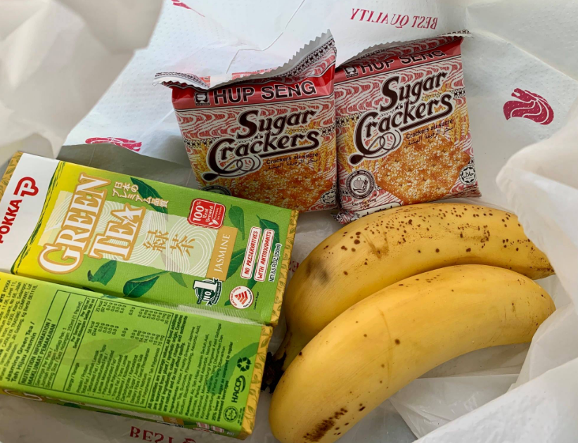 packet drinks, crackers, and bananas