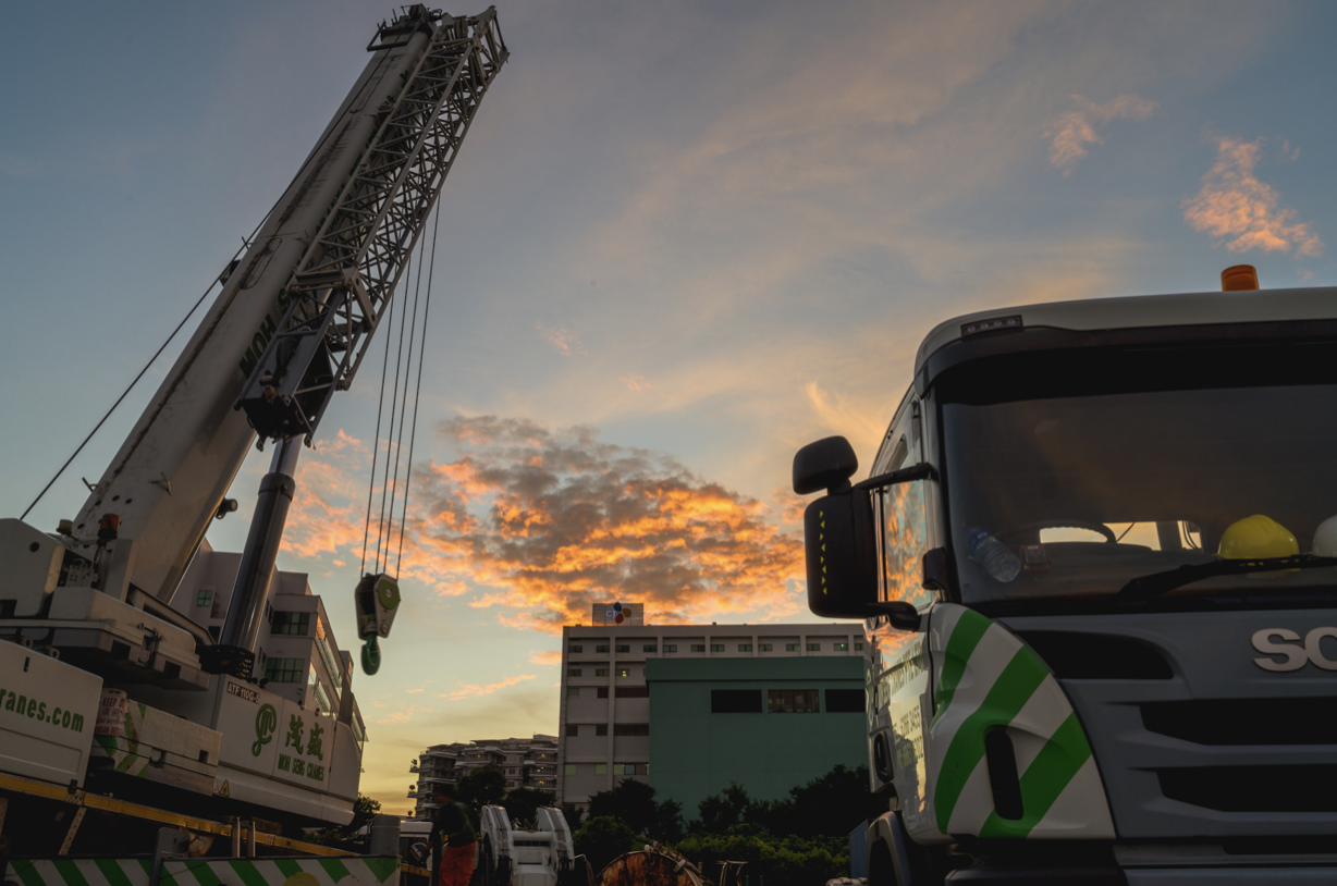 Sunset and heavy vehicles