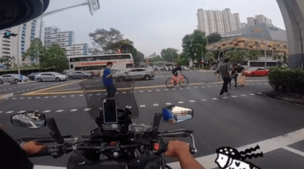 motorcyclist advises cyclist