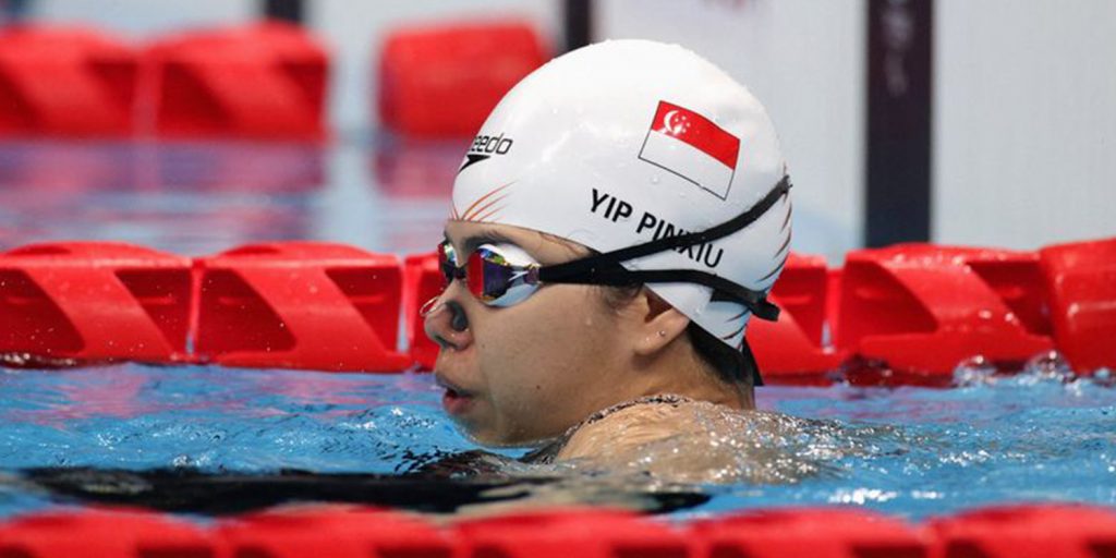 Yip Pin Xiu Finishes First In Women's 100m Backstroke, Brings Home Gold