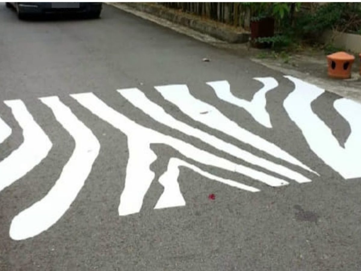 S'pore Man Paints Zebra Crossing To Resemble Actual Pattern 