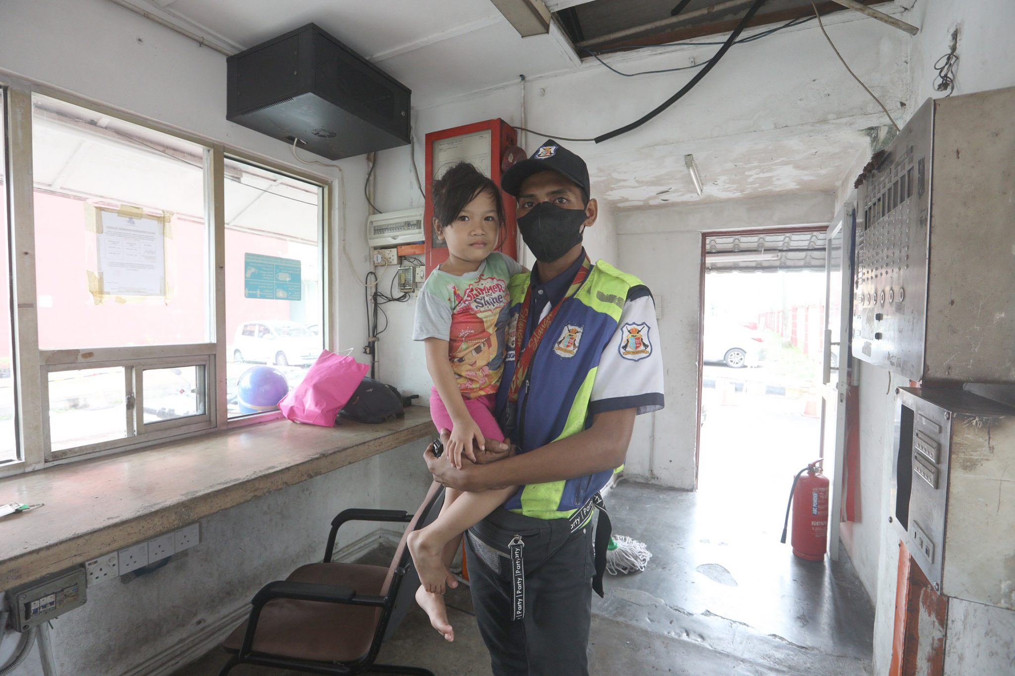 security guard taking care daughter