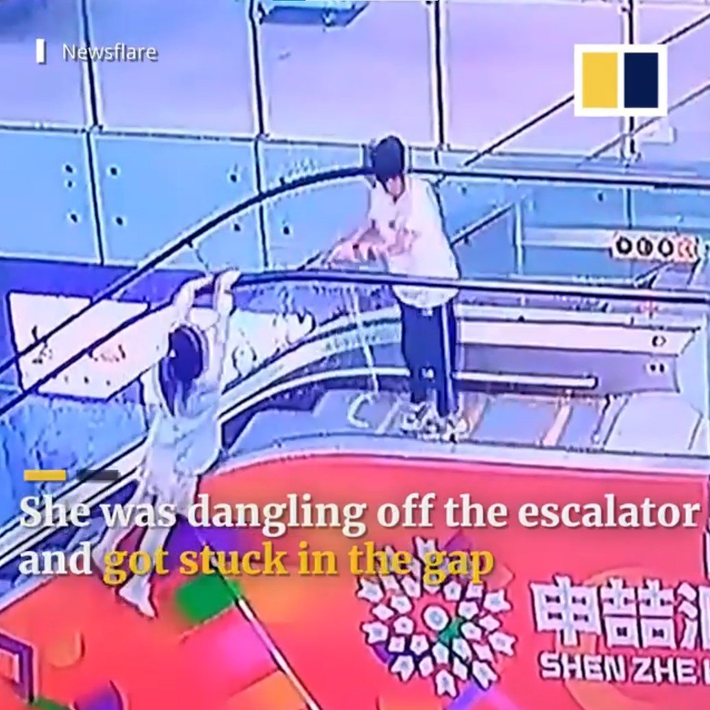 man rescues girl escalator
