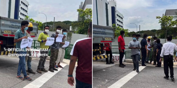9 Men Stand Outside AMK Building Holding Signs Demanding Salaries, Assisting With Police Investigations