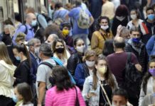 Mask-Wearing Encouraged In Some US Cities As Covid-19, Flu & Respiratory Virus Spread