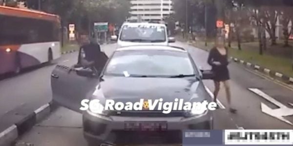 Driver In Hougang Beats Red Light & Nearly Hits Pedestrian, Swapped Seats With Passenger Earlier