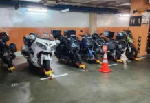 Row Of Motorcycles Get Wheel-Clamped In NUH Carpark For Occupying Lots Meant For Cars