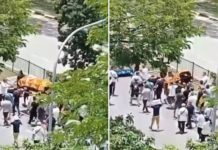 Casket falls after poles break during funeral procession along Jalan Batu, manages to remain undamaged