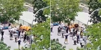 Casket falls after poles break during funeral procession along Jalan Batu, manages to remain undamaged