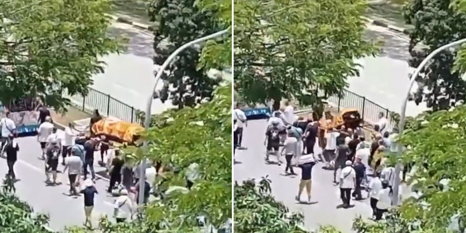 Casket falls after poles break during funeral procession along Jalan Batu, remains undamaged