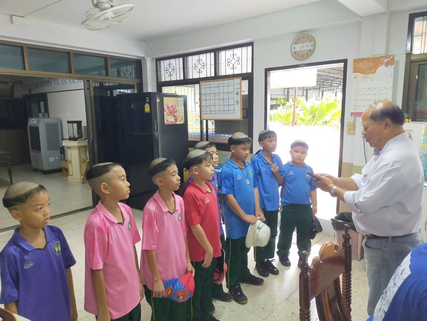 Boys Catholic monk haircut Thailand 1