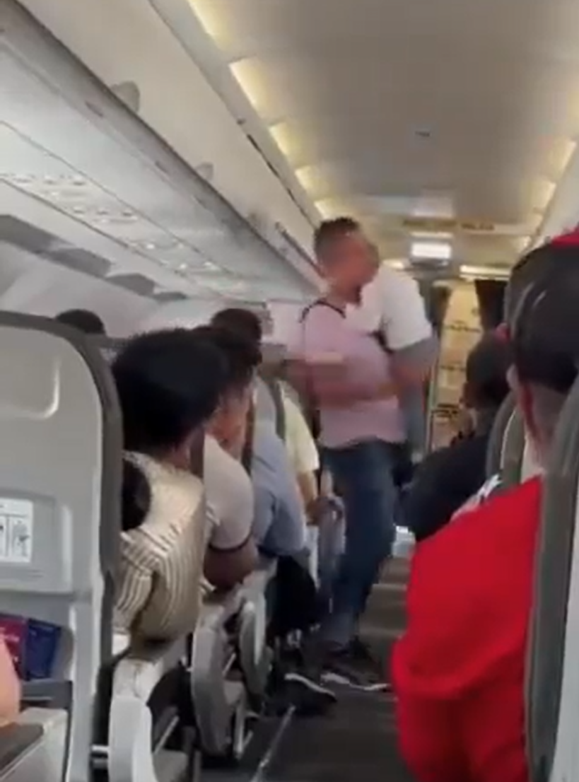 boy colombia kicked out of flight 1