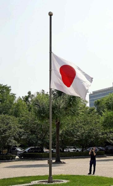 chinese woman saves mother and child, gets honoured with half mast at the japanese embassy