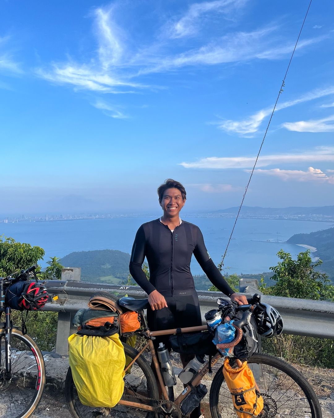 man cycling southeast asia