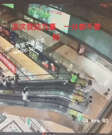boy falls from seventh floor escalator china (2)