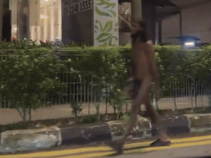 naked man walks around kl