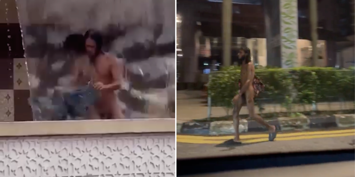 man showering naked in KL fountain