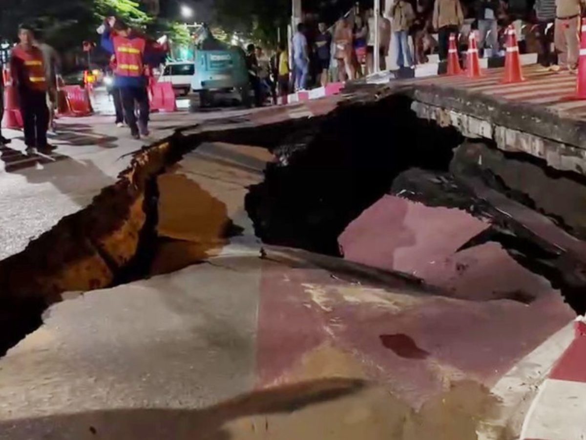 Large sinkhole opens at Bangkok road junction, traffic diverted