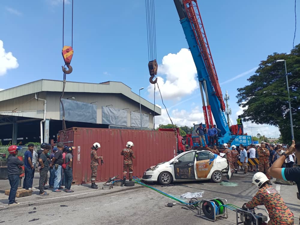 container crushed motorist