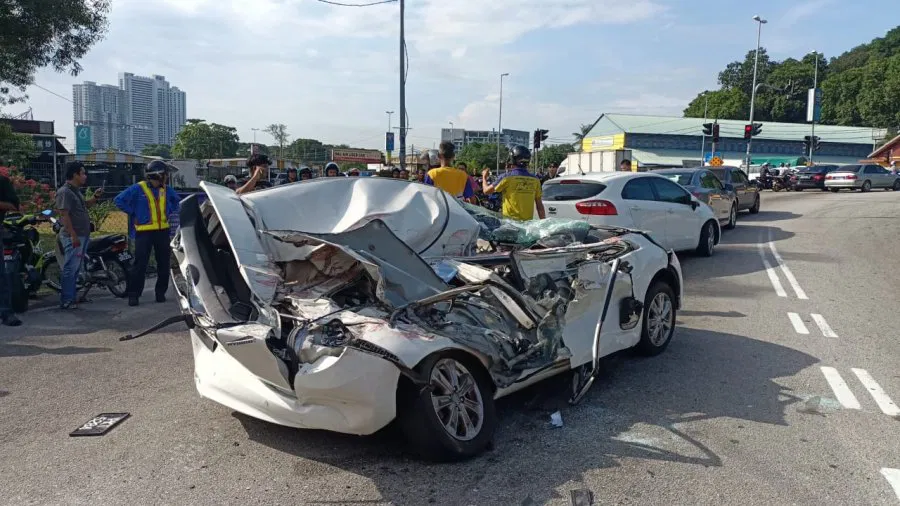 container crushed motorist