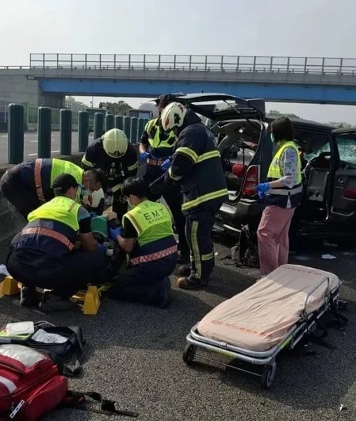 man loose truck tire EMT