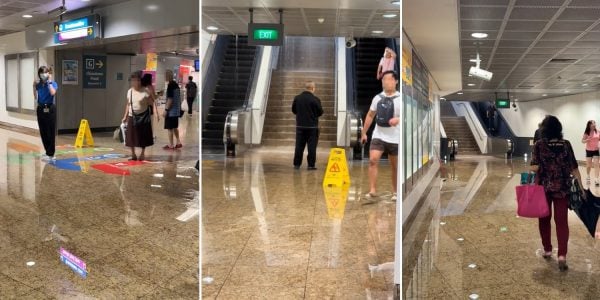 Water rains down on escalator & stairs at Chinatown MRT station exit, pools on floor