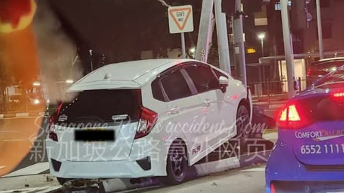 Car crashes head-on into lamp post at Sengkang East Ave, post