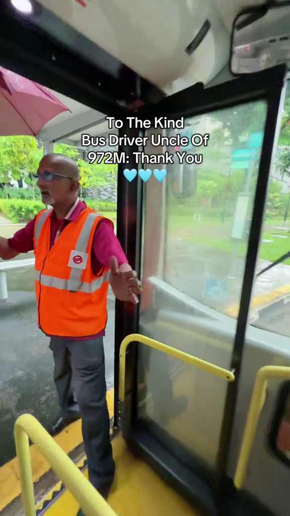 bus driver umbrella rain service