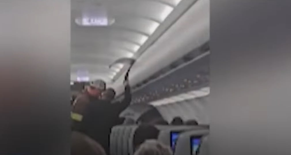 jetblue emergency exit girlfriend arrest