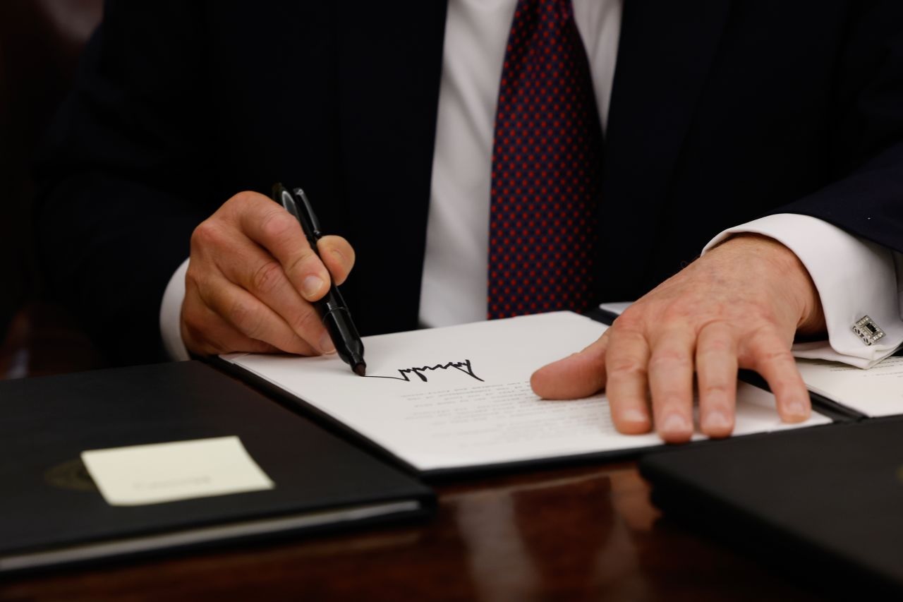 president trump first day signing