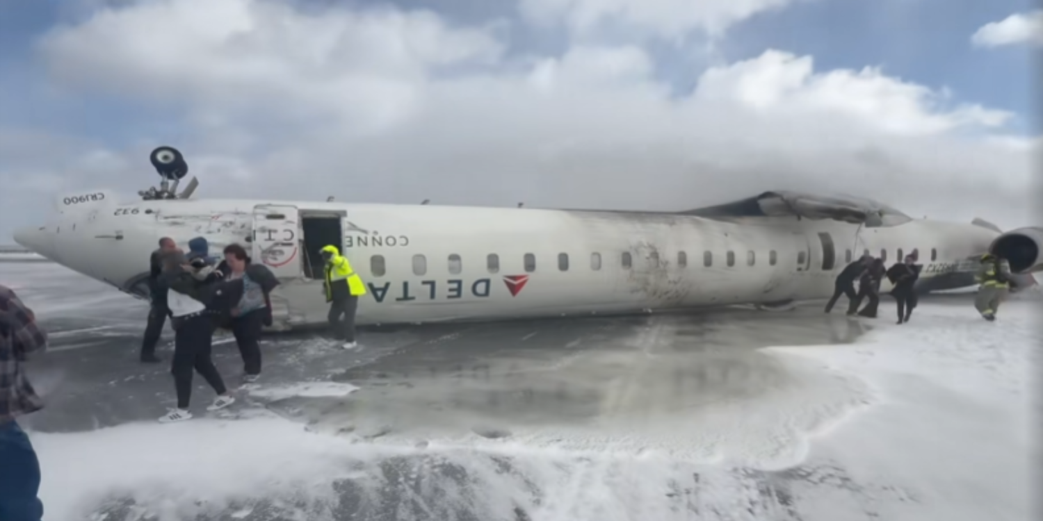 Delta Air Lines plane flips during landing at Toronto airport, child