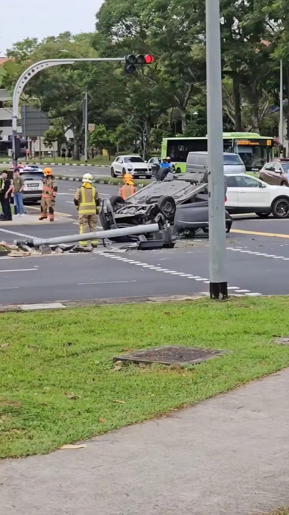 Car flips upside down & knocks traffic light over in Serangoon, driver ...