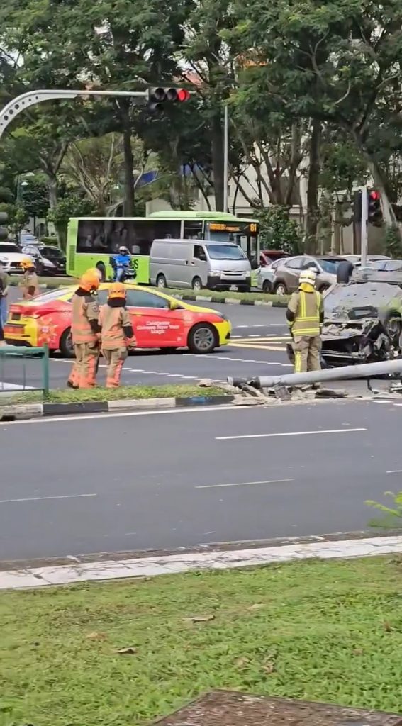 Car flips upside down & knocks traffic light over in Serangoon, driver ...