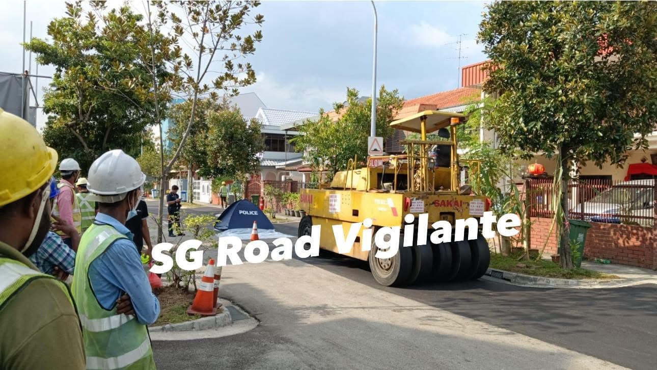 traffic controller road roller