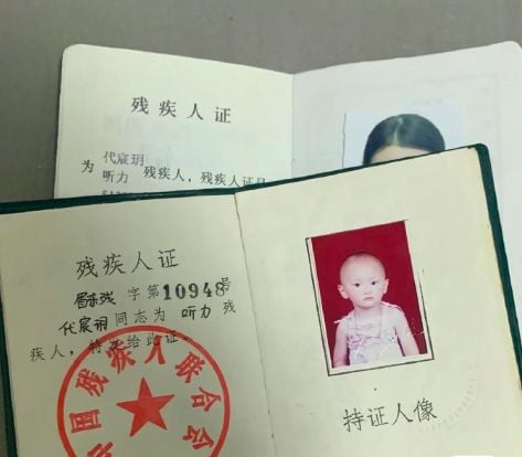 deaf-mute student looks documents