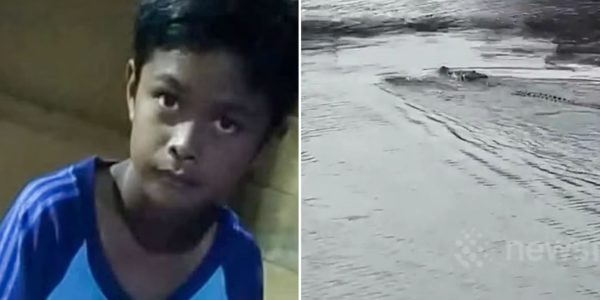 boy crocodile indonesia