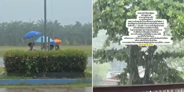 students raise flag rain (2)