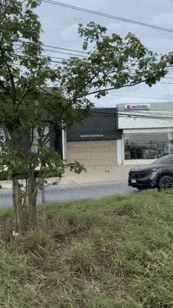 suv against traffic motorcycles footage