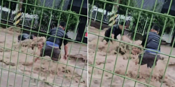 South Korean men rescue elderly man trapped in floodwaters