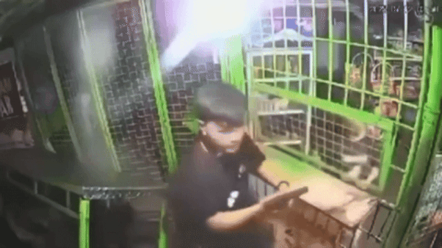 drunk policeman store gun (1)