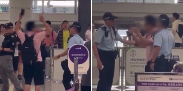 man yells hong kong airport