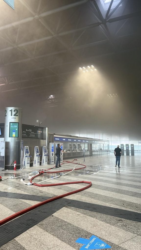 man fire italy airport