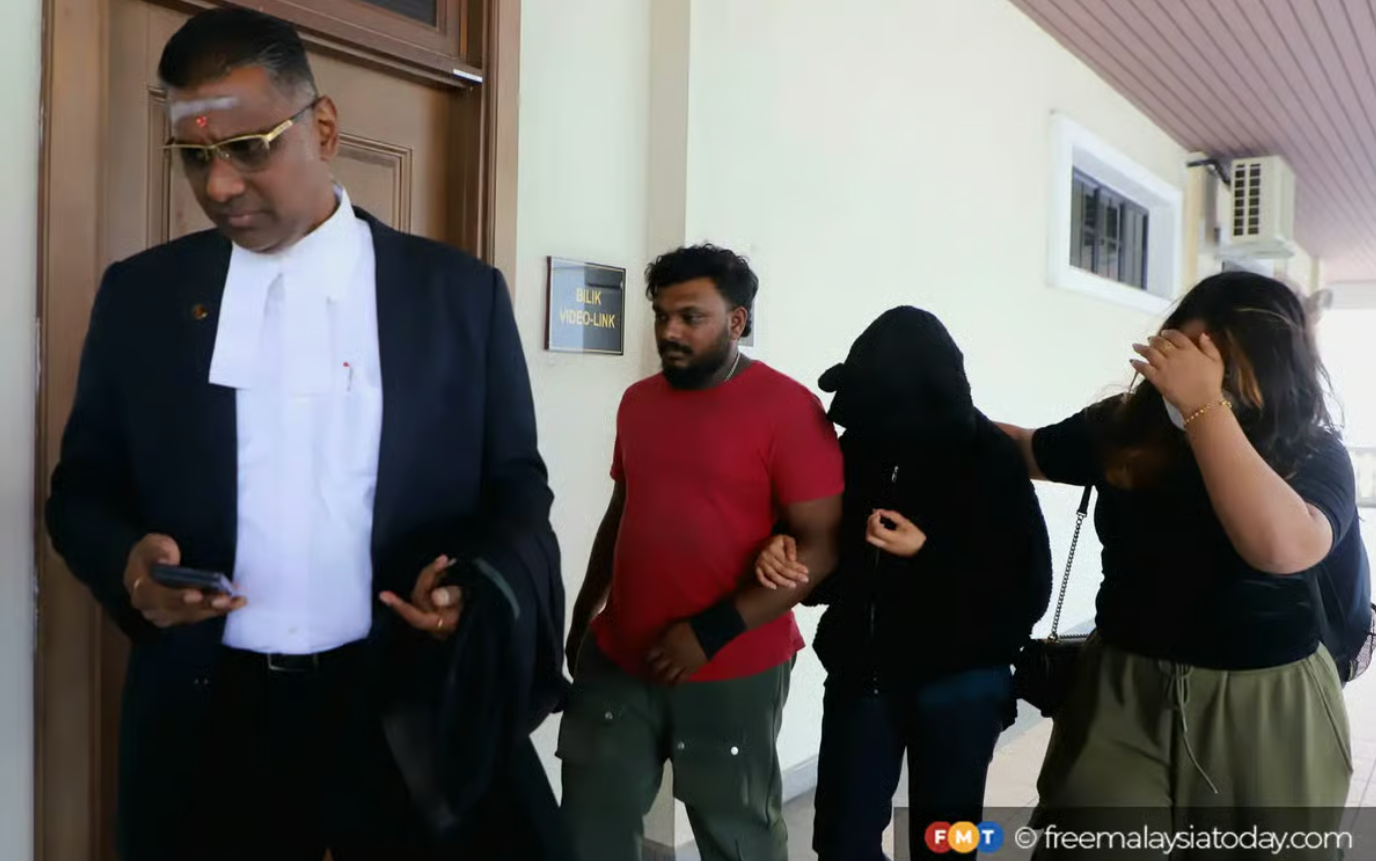 woman throwing baby window