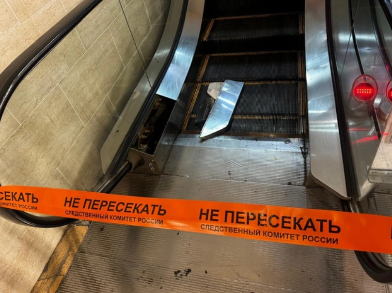 severed arm escalator russia