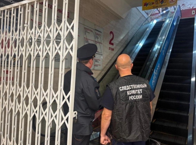 severed arm escalator russia