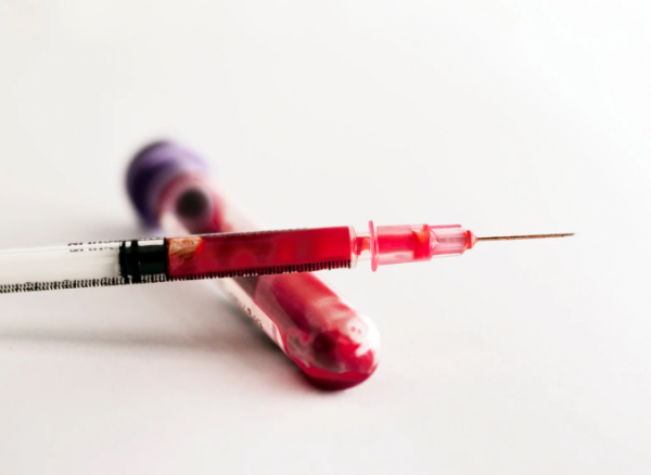 man drawing blood stress