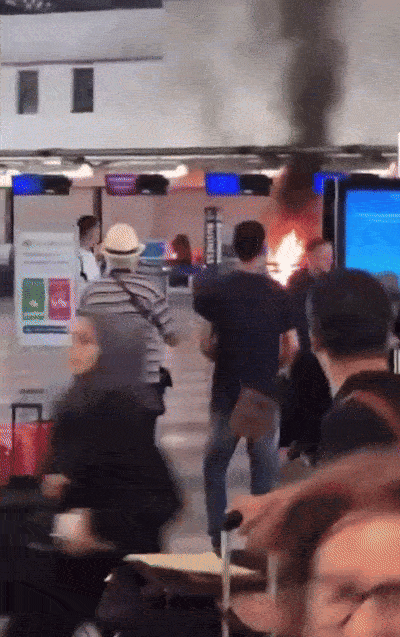 man fire italy airport