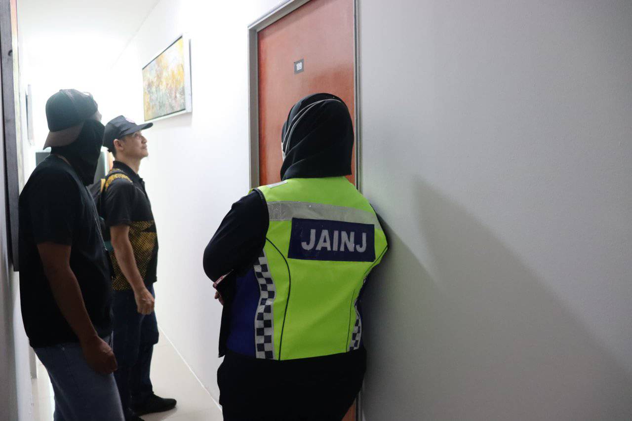 sleeping religious police raid door