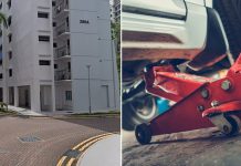 woman under car
